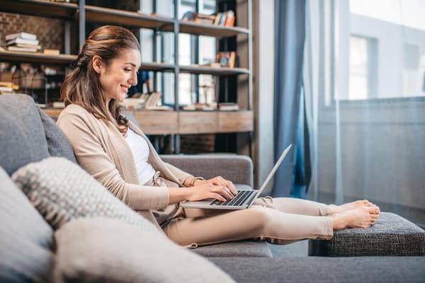 a woman enjoying internet at her vacation home