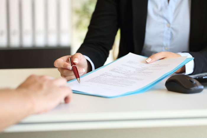 Signing a vacation rental agreement