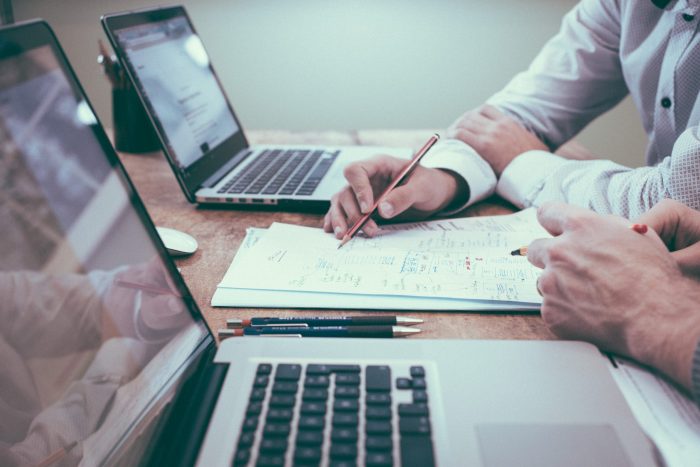 Business people working with laptops