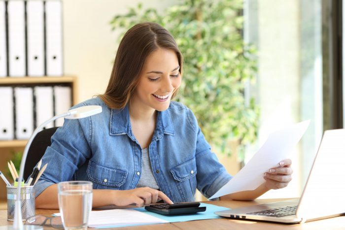 host looking over her Airbnb pricing strategy