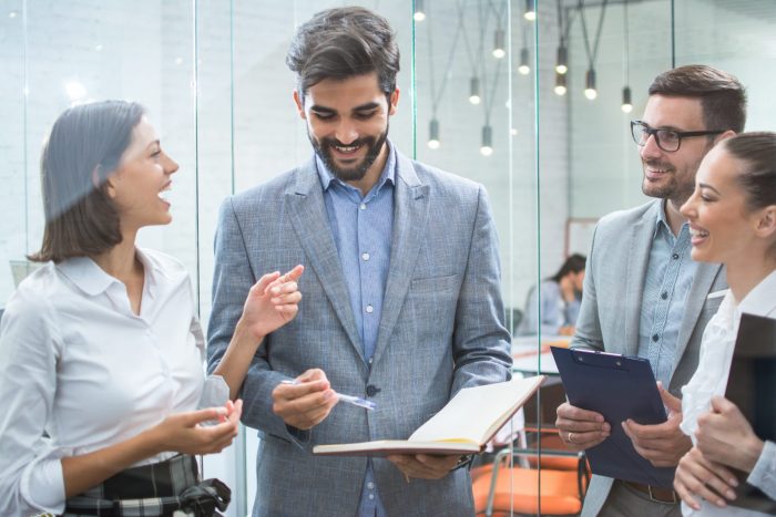 Business team discussing how to start an Airbnb business