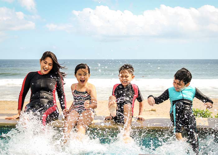 Children playing in popular beach town