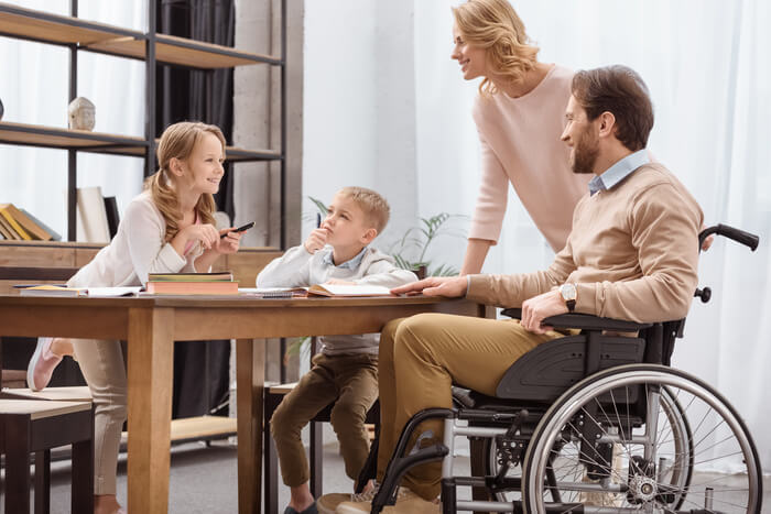 a family enjoying time together at a wheelchair accessible vacation rental