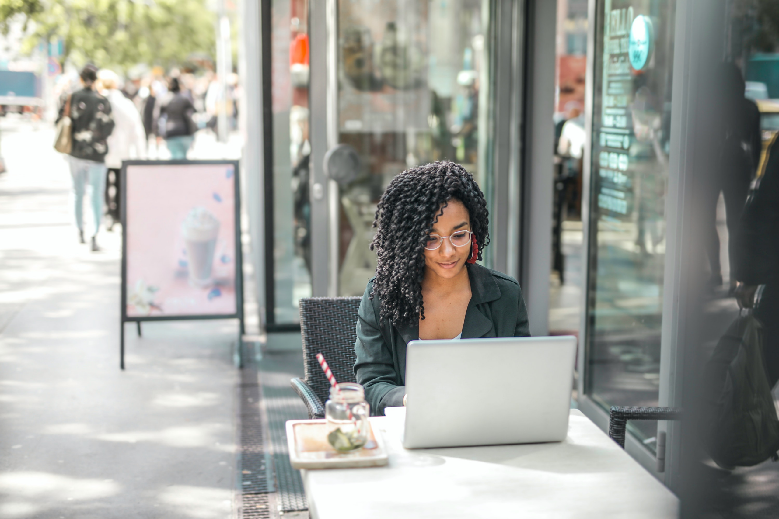 Woman browsing Airbnb platform on laptop